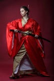 Girl In A Kimono With A Katana Royalty Free Stock Images