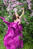 Girl In A Pink Dress Flying Stock Photo
