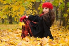 Girl In Autumn Park Royalty Free Stock Photo