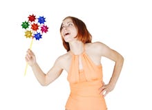Girl In Bright Clothes Holding Pinwheelling, Isola Royalty Free Stock Photos Girl In Bright Clothes Holding Pinwheelling, Isola Royalty Free Stock Photos