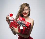 Girl In Red Dress With Gifts On Valentines Day Royalty Free Stock Photo