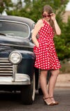 Girl In Red With Vintage Car Stock Images