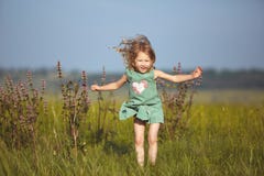 Girl In The Field At Sunny Summer Morning Royalty Free Stock Photography