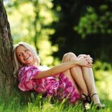 Girl Lying Under A Tree Royalty Free Stock Photography