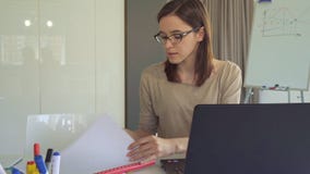 Girl opens journal at the table royalty free stock photography Girl opens journal at the table royalty free stock photography