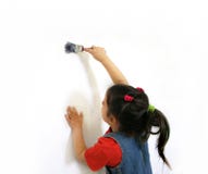 Girl painting a wall