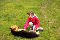 Girl Playing With Dog Royalty Free Stock Images
