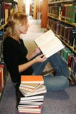 Girl reading in the library