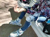 Girl roller skater with safety equipment - knee and elbow pads royalty free stock photos Girl roller skater with safety equipment - knee and elbow pads royalty free stock photos