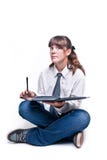 Girl Sitting With Book And Pen Royalty Free Stock Photo