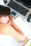 Girl Sleeping With Laptop And Book Royalty Free Stock Photo