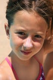 Girl with sunscreen in her nouse Royalty Free Stock Image Girl with sunscreen in her nouse Royalty Free Stock Image