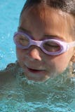 Girl Swimming In The Pool Stock Photos