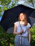 Girl with umbrella in a rainy day stock photography Girl with umbrella in a rainy day stock photography