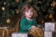 Girl under the Christmas tree