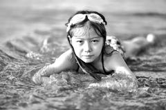 Girl Wearing Goggles on Beach in Black and White Stock Photo Girl Wearing Goggles on Beach in Black and White Stock Photo