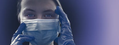 Girl wearing protection face mask and blue nitrile surgical gloves against coronavirus. Banner panorama medical staff preventive