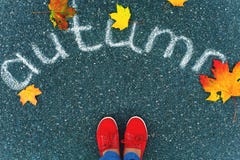Girl wearing red shoes standing on the pavement royalty free stock photos Girl wearing red shoes standing on the pavement royalty free stock photos