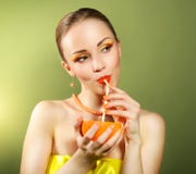 Girl With Beautiful Make-up Holding Orange Fruit Stock Photos