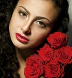 Girl With Roses And Red Lips Stock Photo