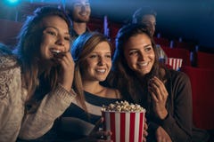 Girlfriends at the cinema Royalty Free Stock Image Girlfriends at the cinema Royalty Free Stock Image