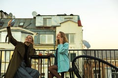 Girls in cafe on rooftop royalty free stock image Girls in cafe on rooftop royalty free stock image