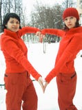 Girls In Red Show Heart Stock Images