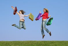 Girls With Packages Royalty Free Stock Images