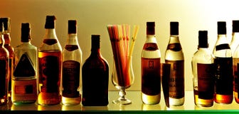 Bottles of wine and liquors at the bar Stock Image Bottles of wine and liquors at the bar Stock Image