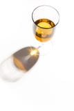 Glass glasses with drinks of different colors on a white background. Top view. The concept of an alcoholic cocktail stock photography Glass glasses with drinks of different colors on a white background. Top view. The concept of an alcoholic cocktail stock photography