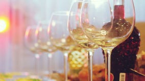 Glass glasses on a table in a restaurant, banquet table, glasses of wine stage lighting. royalty free stock photography Glass glasses on a table in a restaurant, banquet table, glasses of wine stage lighting. royalty free stock photography