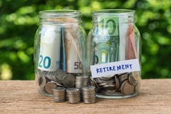glass jar bottles labeled as retirement with full of coins and b royalty free stock images glass jar bottles labeled as retirement with full of coins and b royalty free stock images