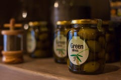 Glass jar with green olives. royalty free stock image Glass jar with green olives. royalty free stock image