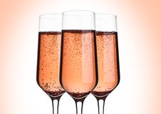 Glass Of Pink Rose Champagne With Bubbles On Pink Stock Images