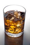 Glass Of Whiskey And Ice Stock Images