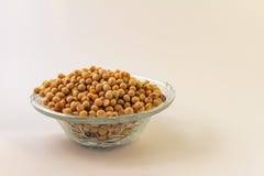 Glass pot with soy seeds. Legumes to be processed. Soybeans royalty free stock photos Glass pot with soy seeds. Legumes to be processed. Soybeans royalty free stock photos