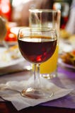 A glass of red wine is on the table. stock photos A glass of red wine is on the table. stock photos