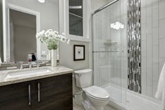 Glass walk-in shower in a bathroom of luxury home
