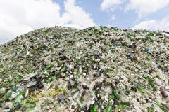 Glass waste in recycling facility. Pile of bottles. stock photos Glass waste in recycling facility. Pile of bottles. stock photos
