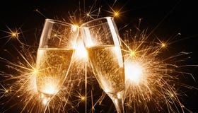 Glasses Of Champagne With Sparklers Royalty Free Stock Photography Glasses Of Champagne With Sparklers Royalty Free Stock Photography