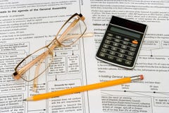 Glasses, pencil and calculator Stock Photo Glasses, pencil and calculator Stock Photo