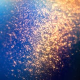 Glitter Lights Abstract Background With Gold Particles. Defocused Bokeh Dark Festive Texture. Stock Image Glitter Lights Abstract Background With Gold Particles. Defocused Bokeh Dark Festive Texture. Stock Image
