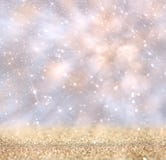 Glitter vintage lights background. gold, silver, and white. de-focused. royalty free stock image Glitter vintage lights background. gold, silver, and white. de-focused. royalty free stock image