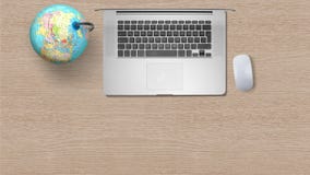 Globe with computer Laptop on white paper on wooden table stock photos Globe with computer Laptop on white paper on wooden table stock photos