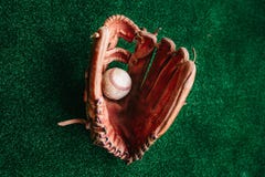 Glove of the baseball catcher and the ball Stock Photo Glove of the baseball catcher and the ball Stock Photo