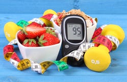 Glucometer με το επίπεδο ζάχαρης, τα υγιή τρόφιμα, τους αλτήρες και το εκατοστόμετρο, το διαβήτη, τον υγιή και φίλαθλο τρόπο ζωής Glucometer με το επίπεδο ζάχαρης, τα υγιή τρόφιμα, τους αλτήρες και το εκατοστόμετρο, το διαβήτη, τον υγιή και φίλαθλο τρόπο ζωής