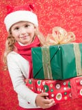 Glückliches kleines Mädchen zur Weihnachtszeit stockfoto Glückliches kleines Mädchen zur Weihnachtszeit stockfoto