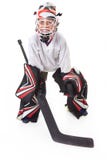 Goaler d'hockey de jeune adolescent photo libre de droits Goaler d'hockey de jeune adolescent photo libre de droits