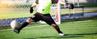 Goalkeeper kick ball to out of goal royalty free stock photography Goalkeeper kick ball to out of goal royalty free stock photography