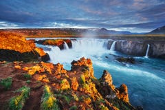 Godafoss waterfall at sunset. Fantastic landscape. Beautiful cumulus clouds. Iceland Europe Royalty Free Stock Photo Godafoss waterfall at sunset. Fantastic landscape. Beautiful cumulus clouds. Iceland Europe Royalty Free Stock Photo